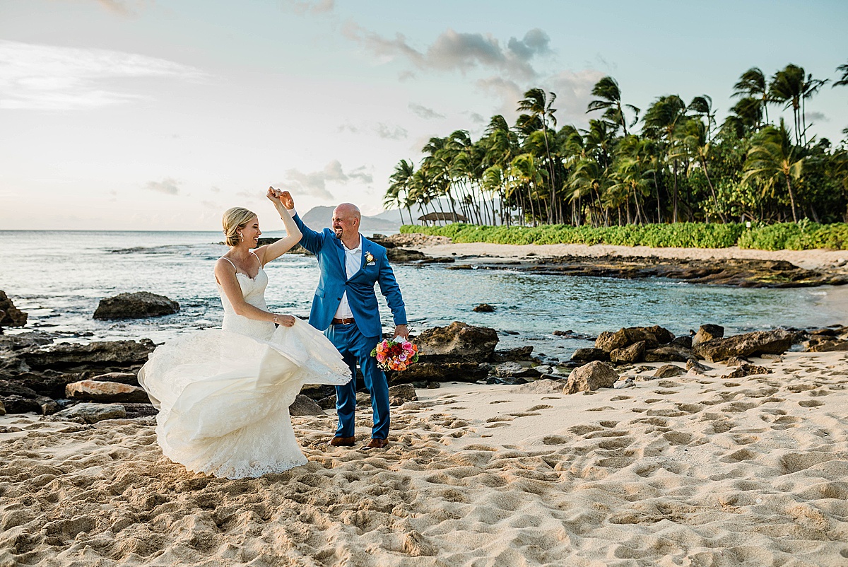 couple eloping on the beach in hawaii