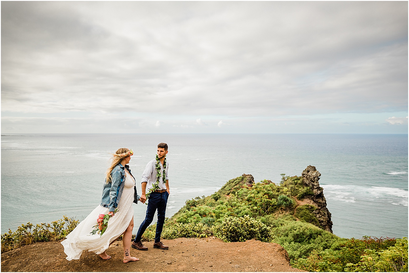 couple hiking in hawaii for their adventure wedding ceremony