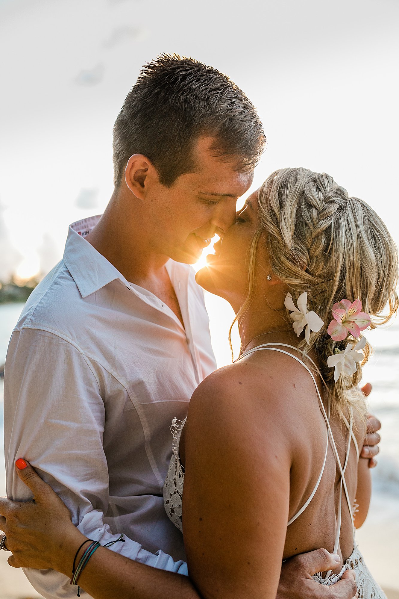 bride and groom in sunset elopement