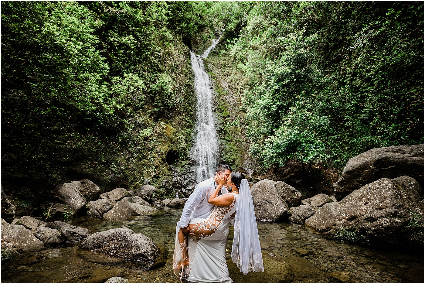 couple at waterfall with tips of how to become an adventure photographer